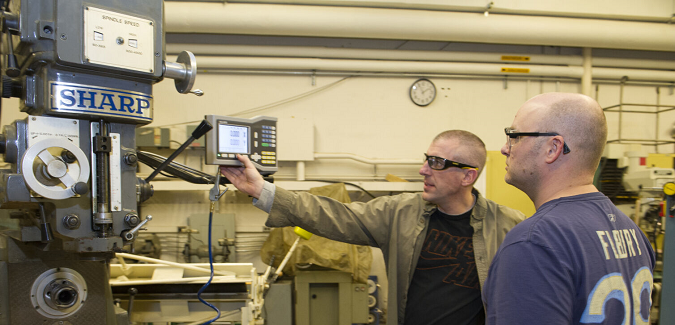 Individuals working in the Machine Shop